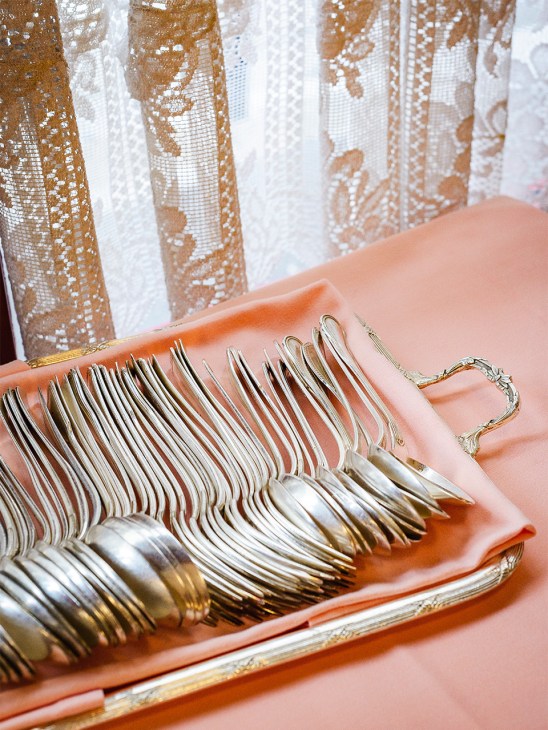 Silver spoons and iconic pink tablecloths at La Poule au Pot