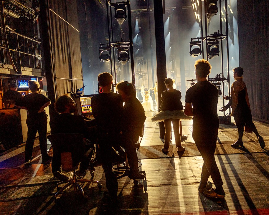 Working in the wings
as dancers perform
onstage