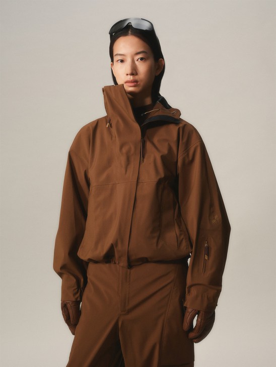 Model wearing Goldwin’s Oyabe 3L jacket in a studio