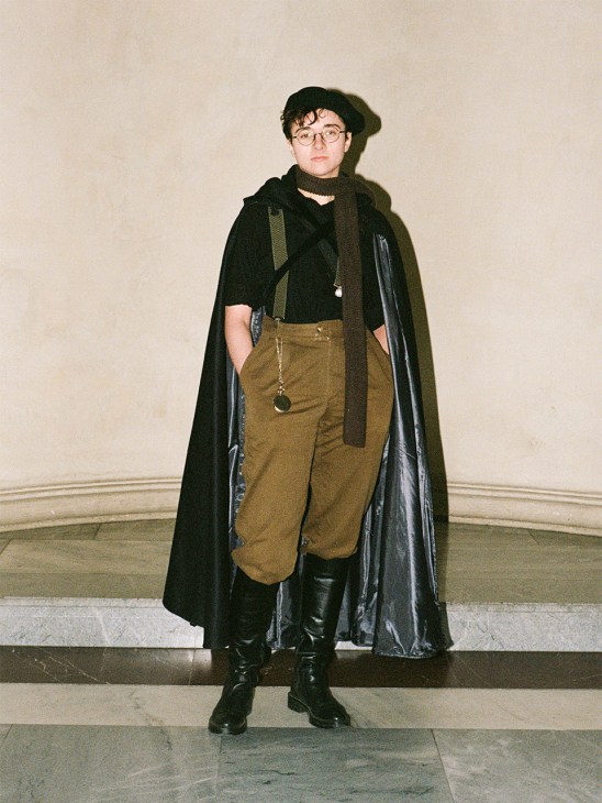 Lucien, student at the University of Vienna in leather cape, suspenders, boots and a beret