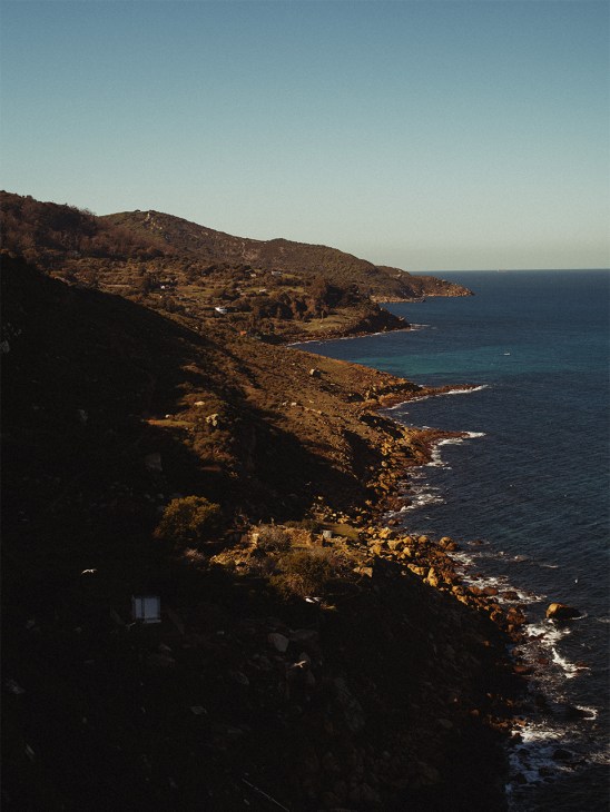 Rugged green coastline of Tangier