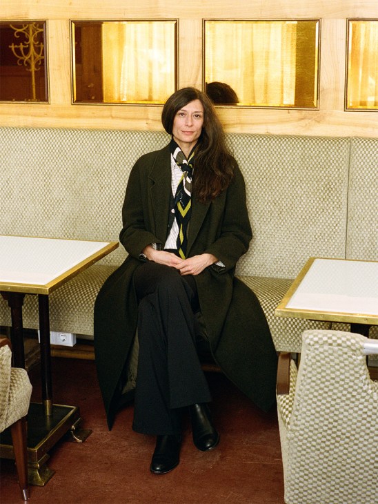 Art historian Nela Eggenberger sits in a cafe