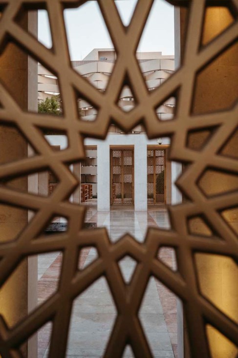 Aperture in patterned-cladding