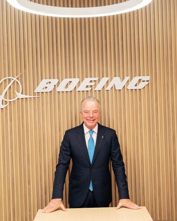 Boeing Global’s president, Brendan Nelson stands in front of a Boeing sign