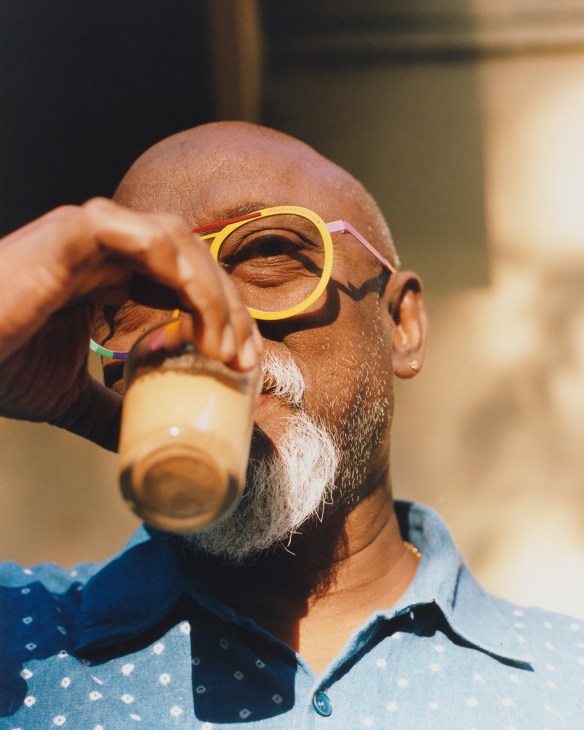 Bose Krishnamachari, co-founder of the Kochi-Muziris Biennale, sips a coffee
