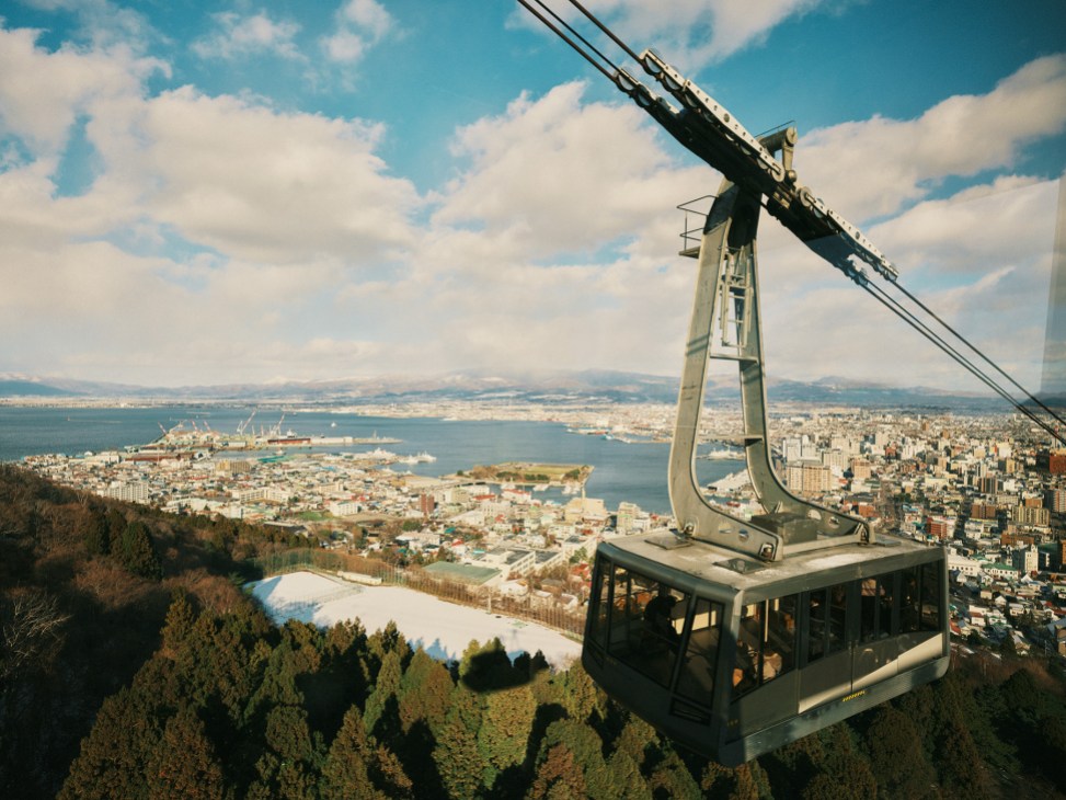 Ascending via cable car up the 334-metre Mount Hakodate