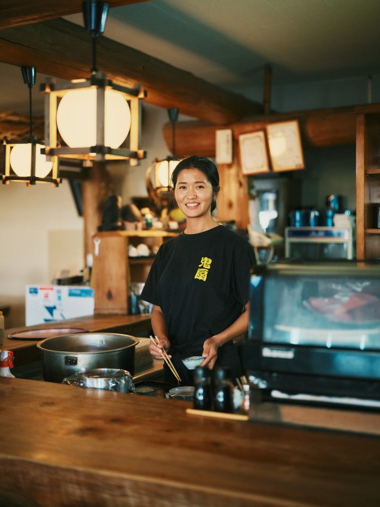 Nao Takashima behind the counter