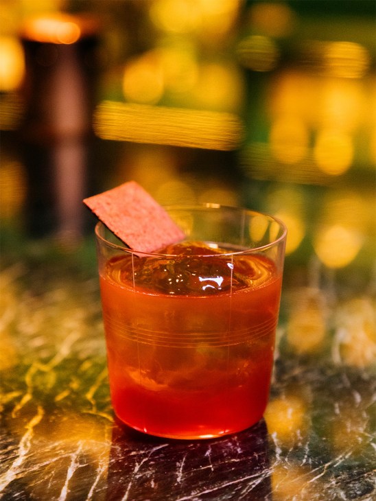 A red cocktail served at the Norm, Bangkok