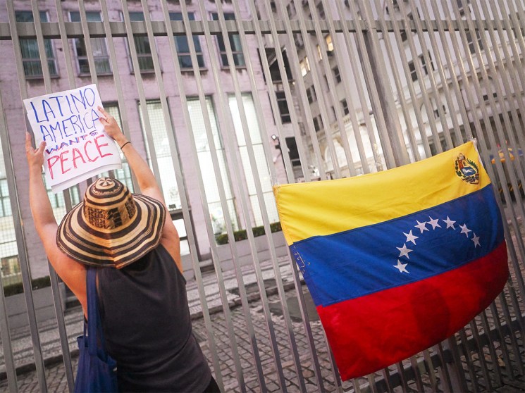 Sign of the times: Protestor outside the US Consulate General in Rio de Janeiro