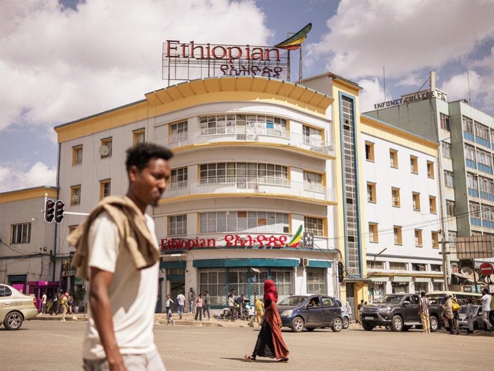 A man walks past Ethiopa airpot as Ethiopian Airlines prepares for expansion