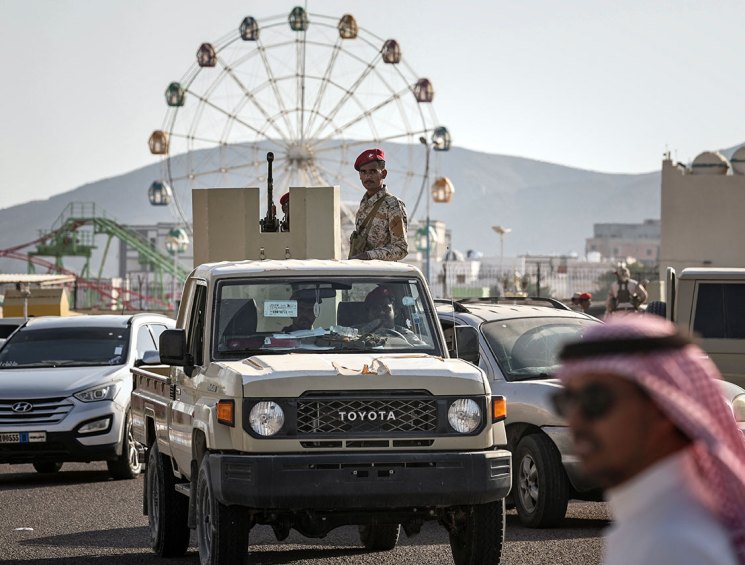 Saudi-backed forces in Yemen - a soldier in the back of a truck