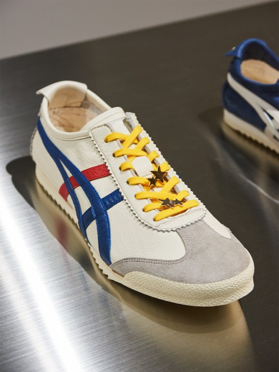 White, blue and red Onitsuka Tiger trainers with yellow laces