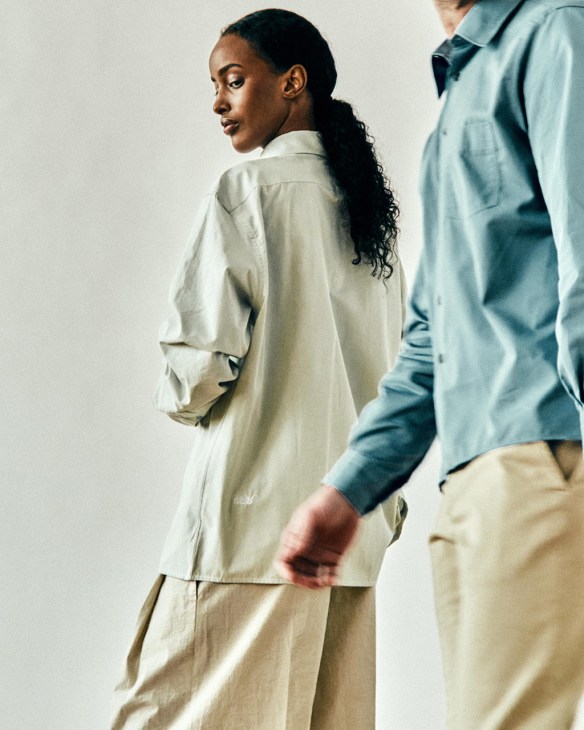 Male and female models dressed in shirts from Camisas Manolo