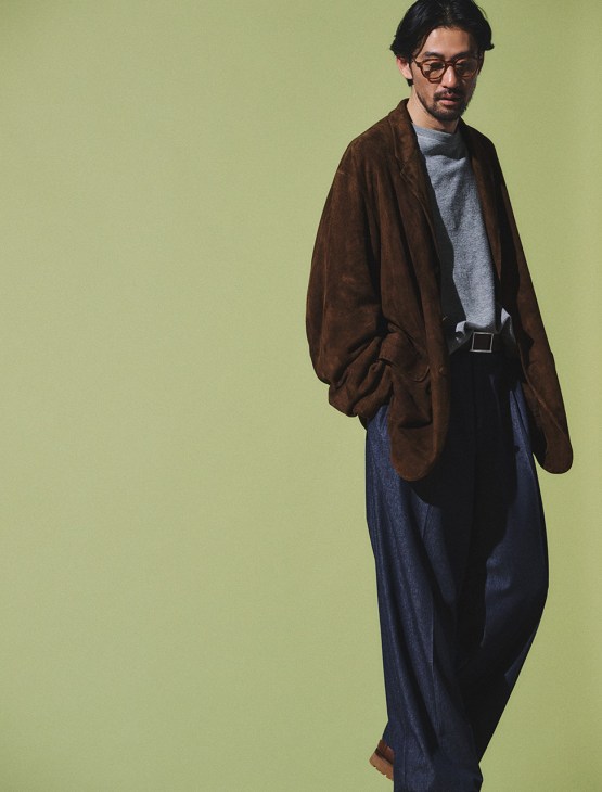 Model wearing Jacket and jumper by Comoli, trousers by Emporio Armani, shoes and belt by J.M. Weston, glasses by Mykita