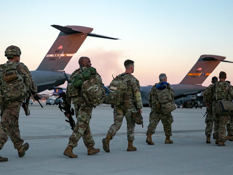 Trump says the Iran war could end in ‘two to three weeks’ despite US troop build-up