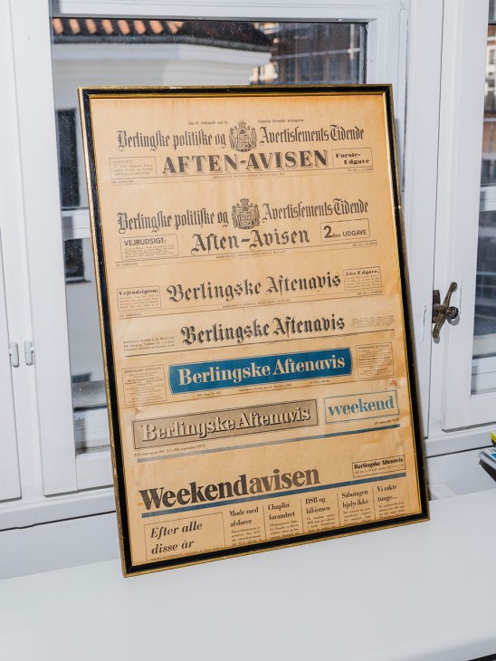 Frame with old copies of Weekendavisen inside