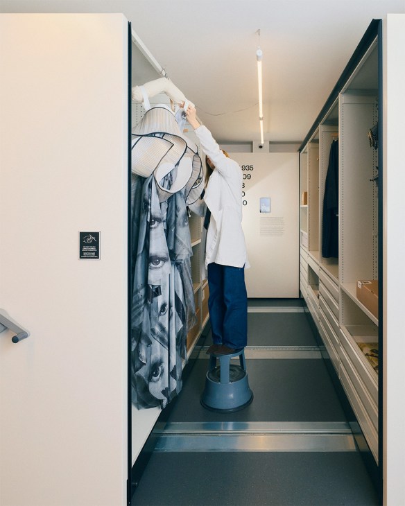 Person working in the archives at ITS