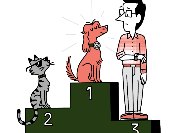 Andrew Tuck on a podium with two dogs