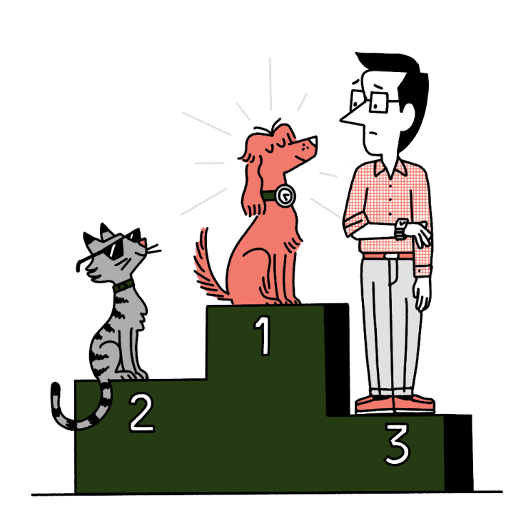 Andrew Tuck on a podium with two dogs