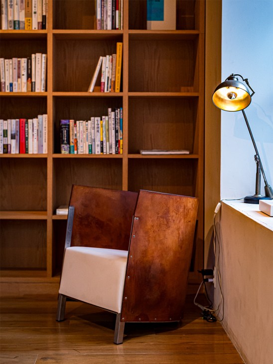 Chair and shelves inside the Yaeca Home Store