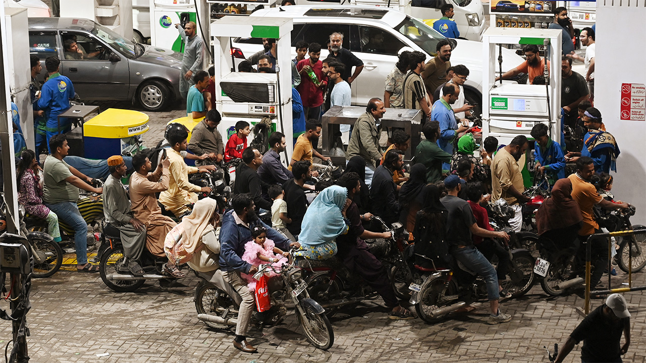 Clients queue at a gas station amid rising petrol prices in Karachi on April 3, 2026. US-Israel war on Iran, launched on February 28, has roiled global energy and equities markets, sending oil prices skyrocketing after Tehran virtually closed the key Strait of Hormuz.
