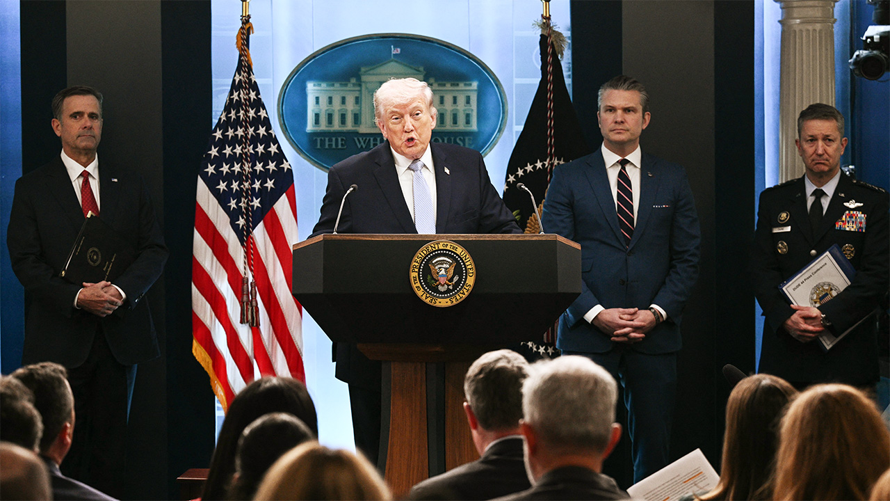 US President Donald Trump, alongside CIA Director John Ratcliffe (L), US Secretary of Defense Pete Hegseth (2R) and Chairman of the Joint Chiefs of Staff General Dan Caine (R), speaks about the conflict in Iran in the James S. Brady Press Briefing Room of the White House on April 6, 2026, in Washington, DC