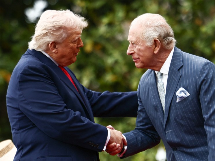 US President Donald Trump and Britain's King Charles III shake hands during an arrival ceremony on the South Lawn of the White House in Washington
