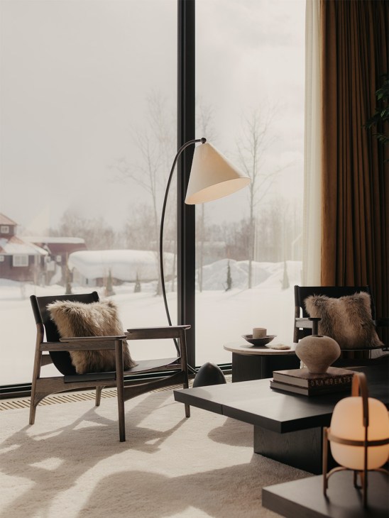 Karimoku Case Study lounge chairs and a Santa & Cole table lamp