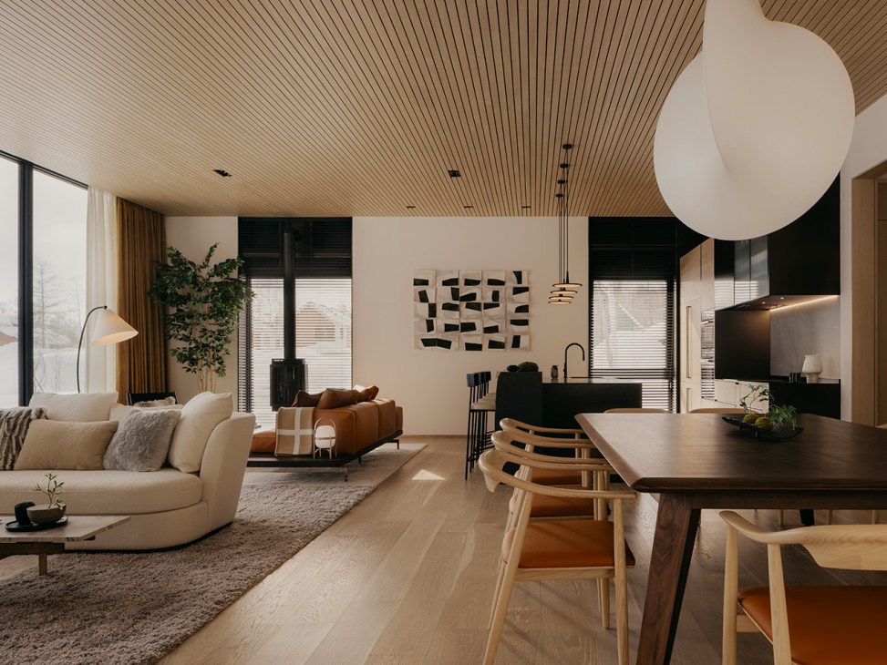 Living spaces, dining area and an open kitchen in one of the Koa Super Villas