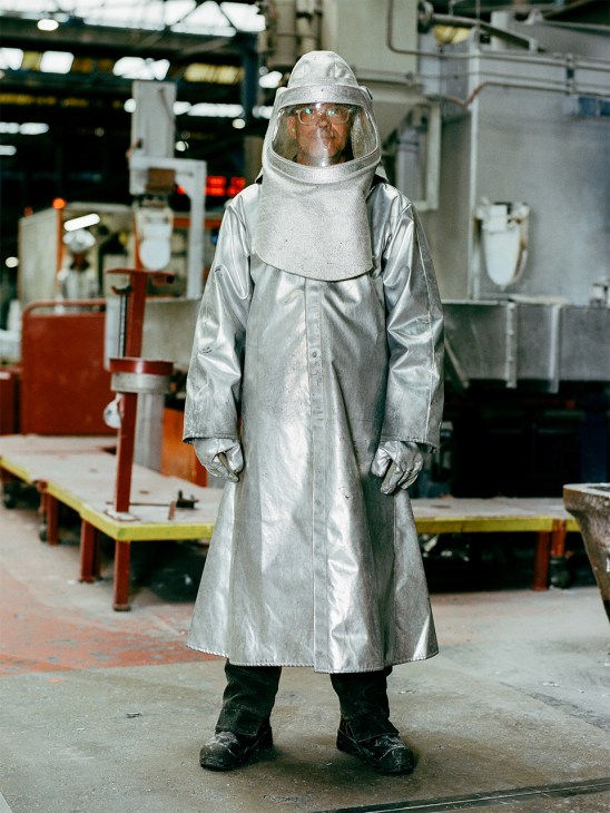 Person in protective clothing at Hydro Circal processing facility