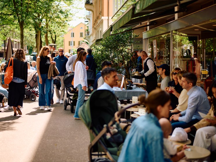 People sitting outside at one of Monocle's markets