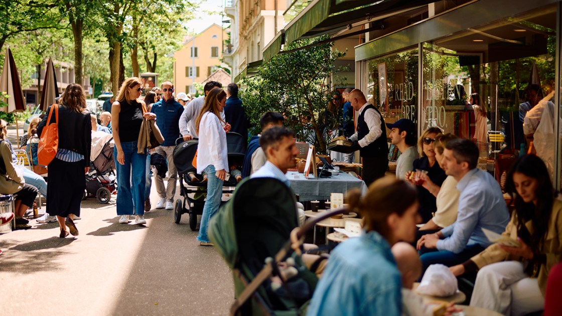 People sitting outside at one of Monocle's markets