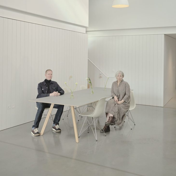 Max Richter and Yulia Mahr standing together in their studio space