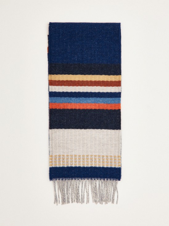 Wallace & Sewell lambswool stripe scarf in Persian blue with navy, black, cream, rust, and light blue horizontal stripes and fringe ends.