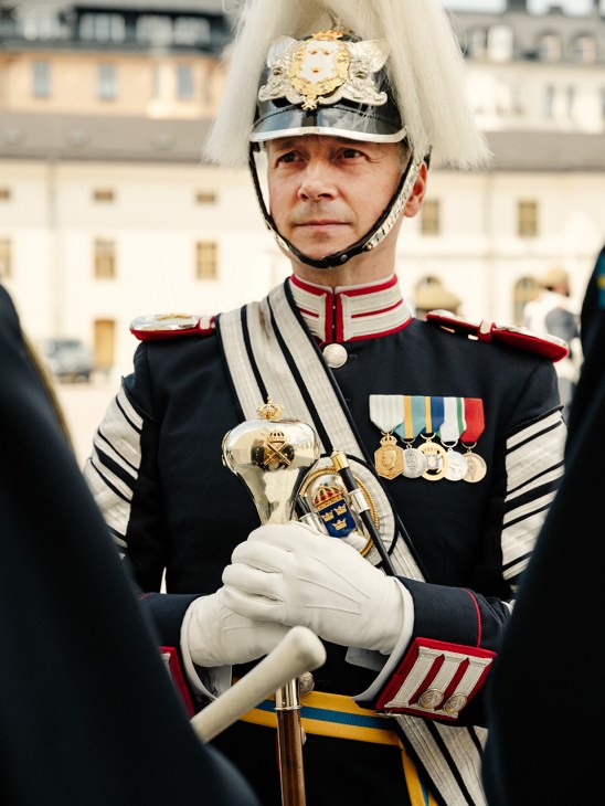 Sergeant Major David Lindberg, drum major of the Swedish Army Band, in full ceremonial uniform with plumed helmet and sword.