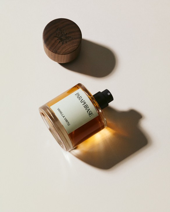 Paraphrase Vanilla Vimil fragrance bottle with wooden star-engraved cap on neutral background