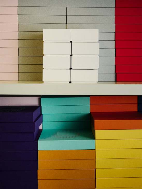 Stacked cream-colored boxes precisely cut and displayed showing clean edges and alignment.