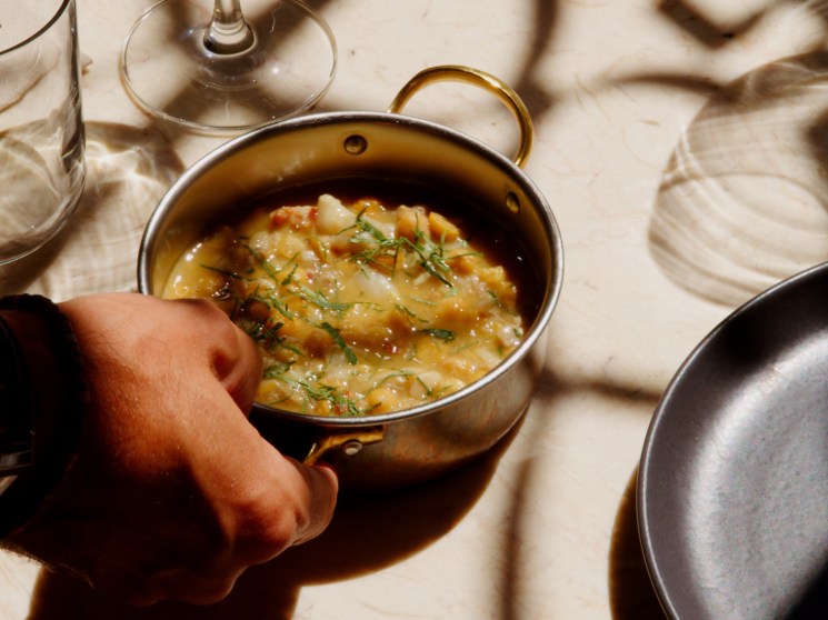 A meal in a pan on a table at a Tasca in Lisbon