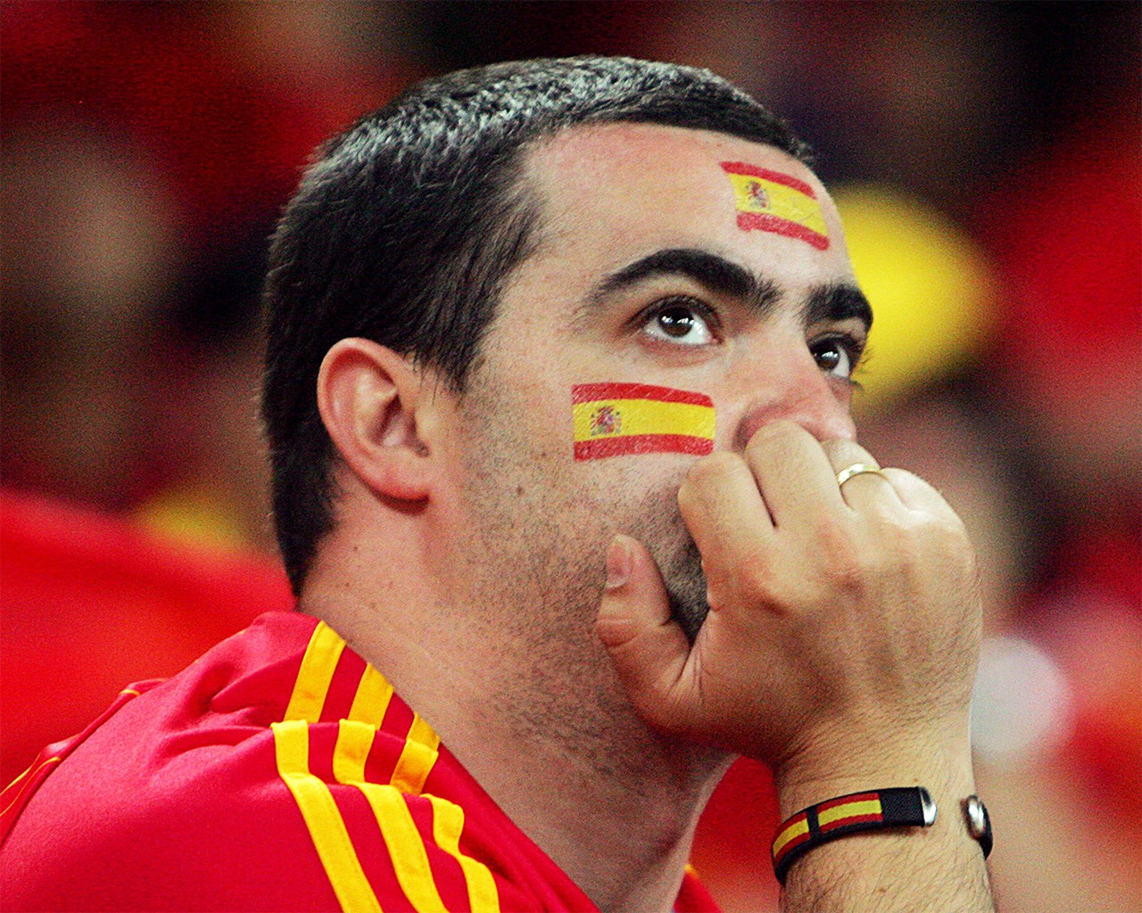 For some, today’s national holiday is a bright display of Spanish pride. For others, it’s something darker