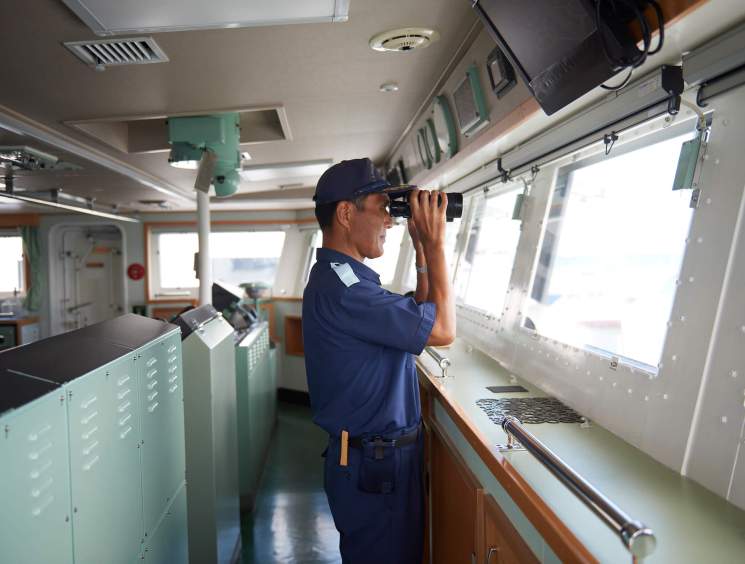 Commanding officer Captain Yoshitaka Morimoto on the lookout