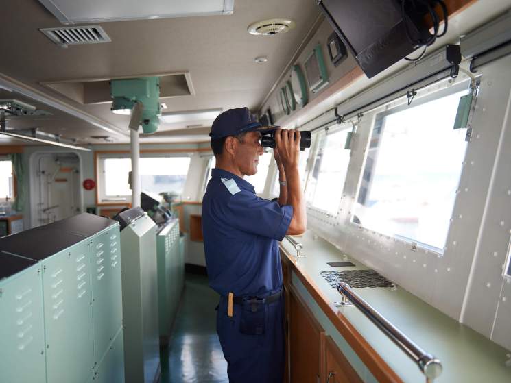 Commanding officer Captain Yoshitaka Morimoto on the lookout