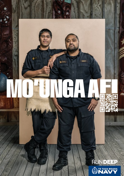 Two navy personnel in dark uniforms standing together with 'MOUNGA AFI' text and QR code overlay