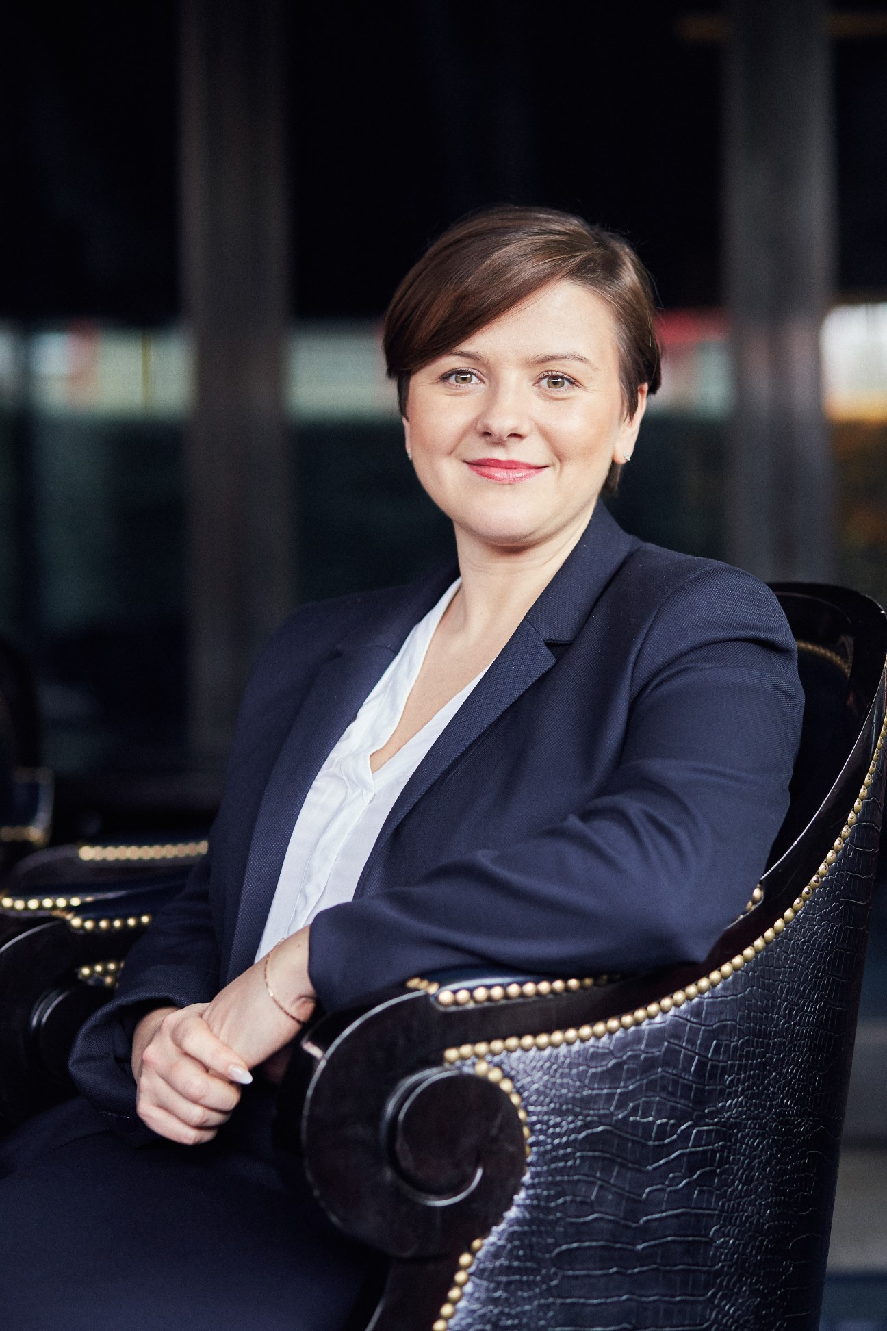 Magdalena Saodatov, front office manager at The Wellesley hotel, seated in professional attire