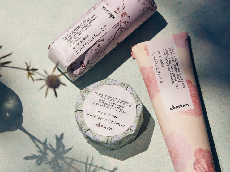 Three products arranged on a soft grey surface.