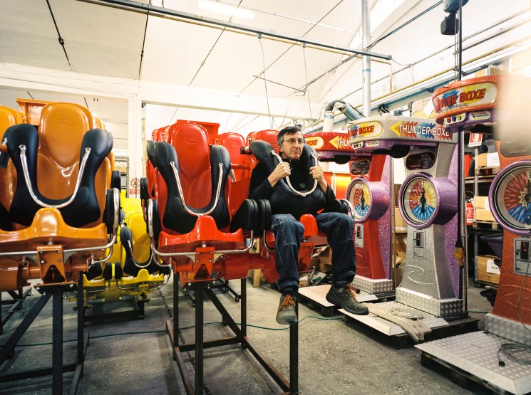 It's a tough job. A worker tries out the new Air Race seat