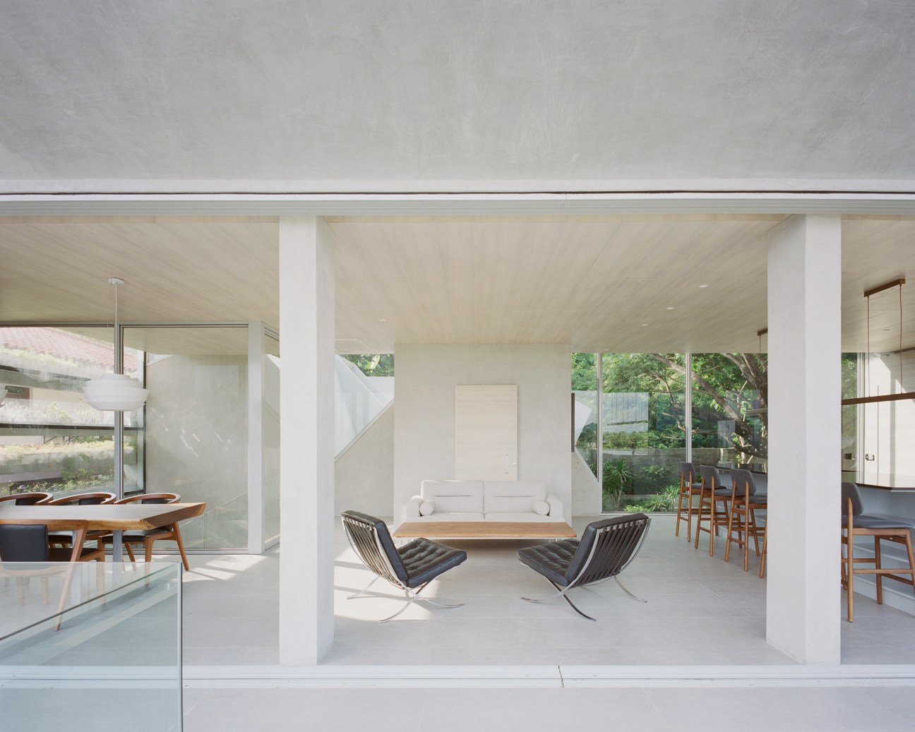Exterior view of Frame House showing thin concrete walls and structural frame design