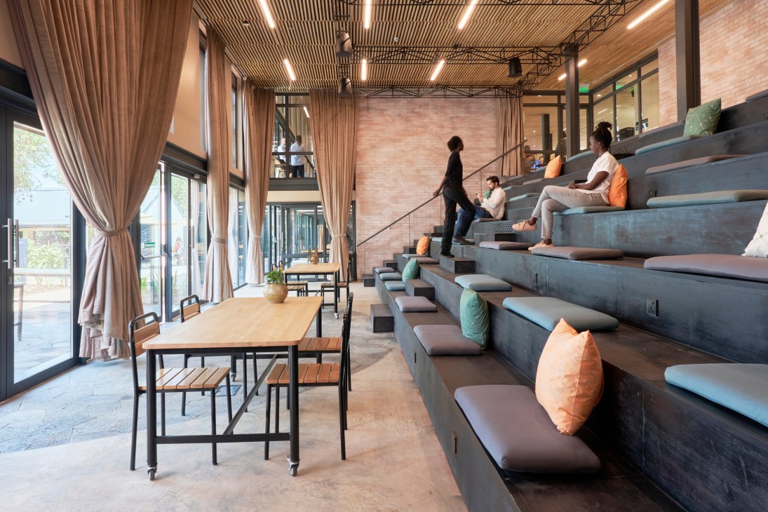 Interior workspace at Norrsken Kigali House showing renovated classroom spaces for local businesses