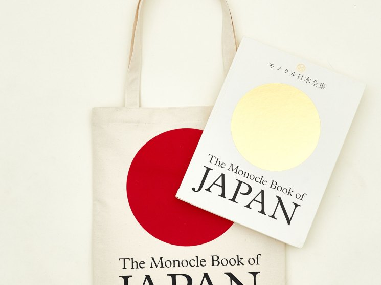 The Monocle Book of Japan displayed with a cream tote bag featuring red circle design