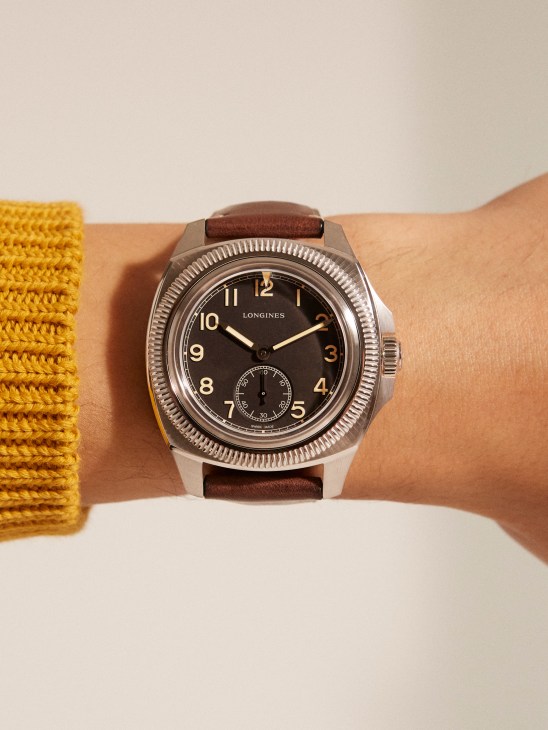 Longines Pilot Majetek watch with black dial and brown leather strap worn on wrist
