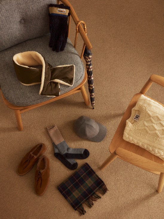 Classic menswear accessories in muted colors including jumper, scarves, shoes, cap, gloves and umbrella